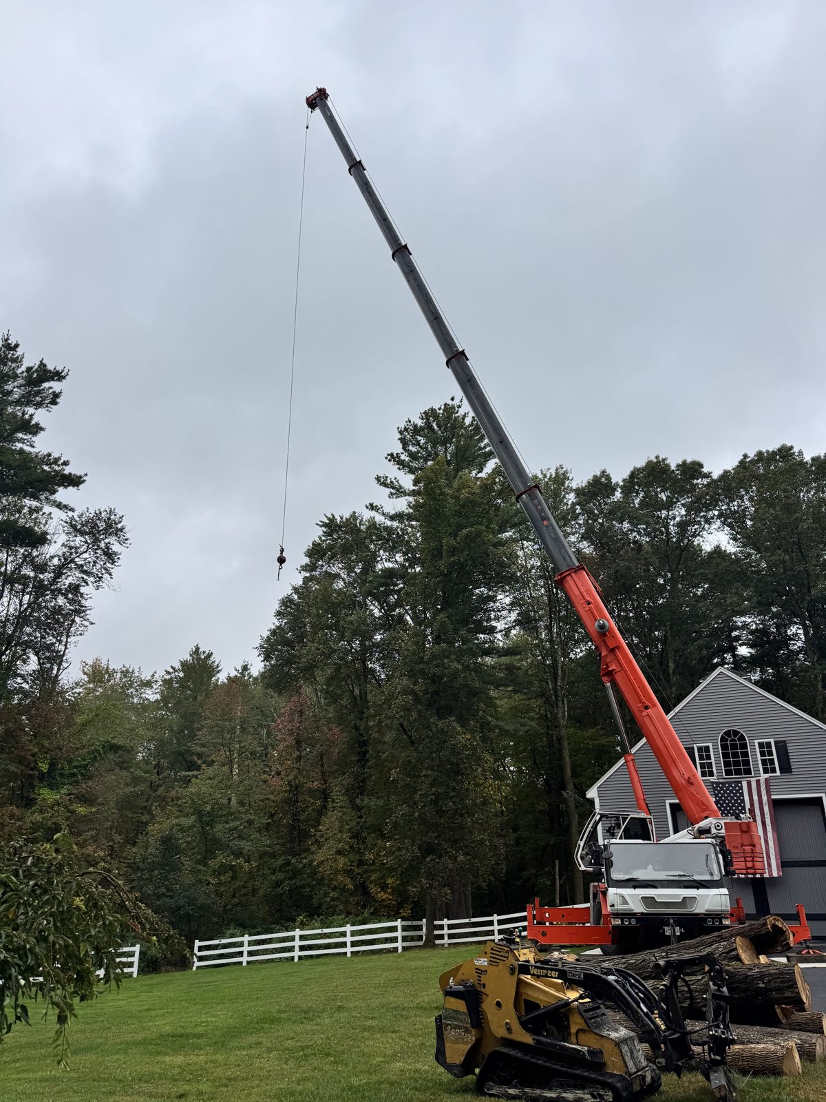 Tree Sons crane and equipment on a job site