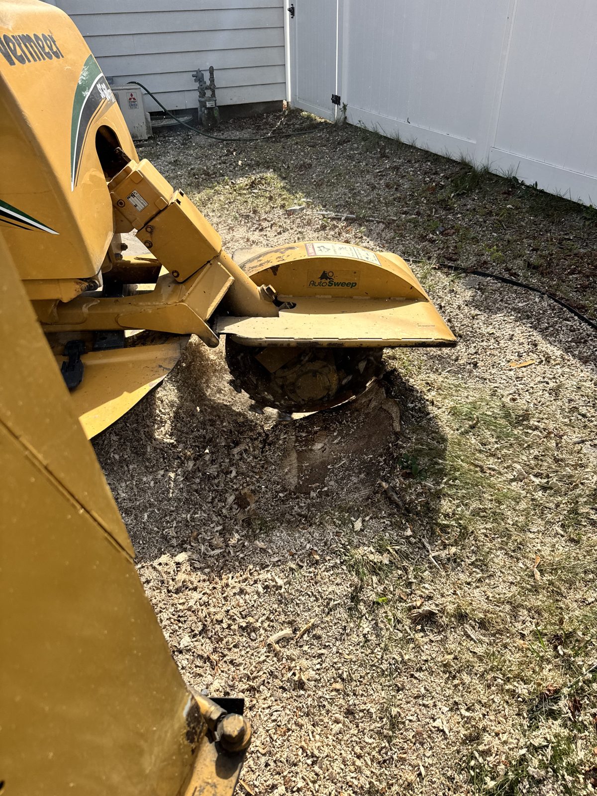 Vermeer stump grinder grinding a stump